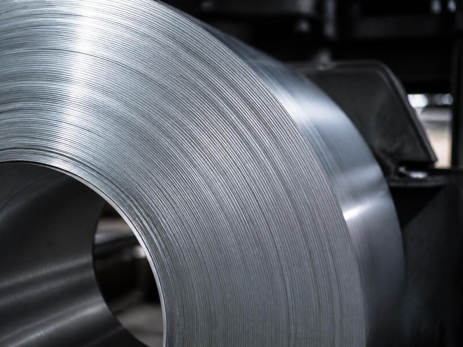 Close-up of a polished aluminium coil in a European metal service centre